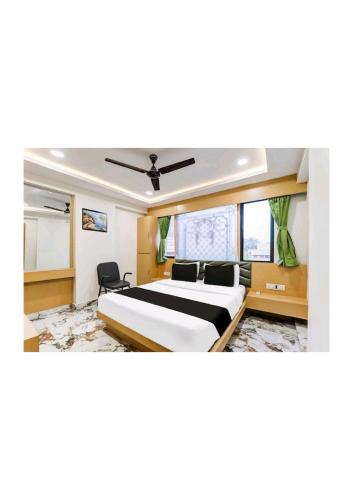 Una cama o camas en una habitación de Hotel Prime 24