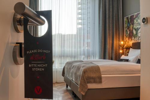 Cama o camas de una habitación en Vienna House Easy by Wyndham Hamburg Bergedorf
