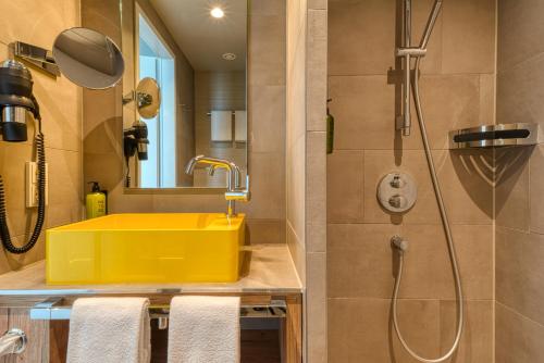 Un baño de Vienna House Easy by Wyndham Hamburg Bergedorf