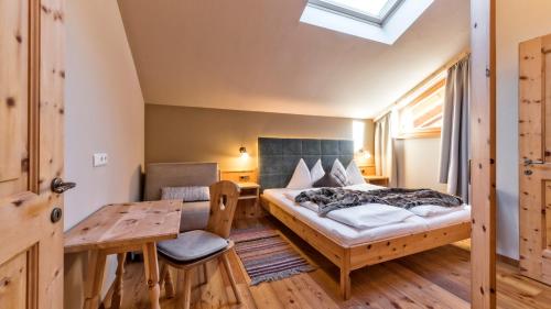 Cama o camas de una habitación en Widmannhof - Urlaub auf dem Biobauernhof