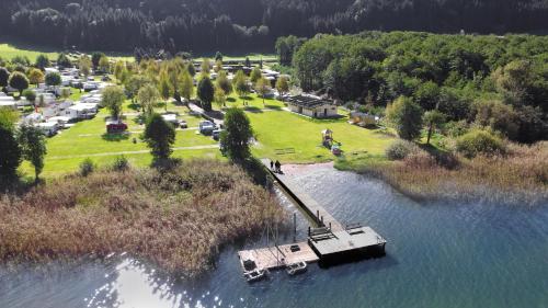an aerial view of a boat in the water at Appartements Caroline in Ossiach