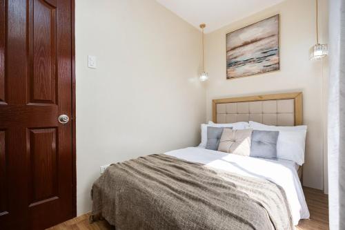 Postel nebo postele na pokoji v ubytování Entire Furnished 3BR House in Central Cebu City with Parking and Washer