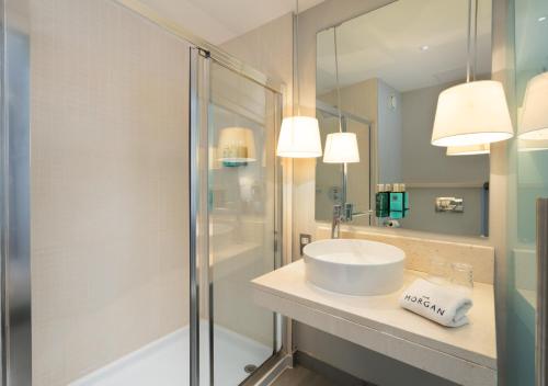 a bathroom with a sink and a shower at The Morgan Hotel in Dublin