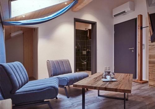 Χώρος καθιστικού στο Auberge Passepartout