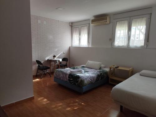 Apartamento y Habitaciones El Colmenar