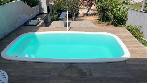 Бассейн в Casa Veraneio próximo a lagoa или поблизости