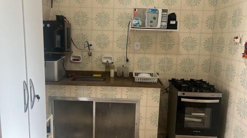 Кухня или мини-кухня в Casa Veraneio próximo a lagoa
