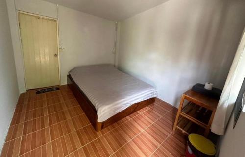 Postel nebo postele na pokoji v ubytování FourTwoEight Mini House