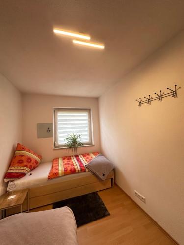 Ferienwohnung "Am Rotmoos"にあるベッド