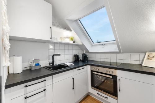 Dapur atau dapur kecil di ANYTIME - Apartments in Langenargen