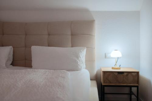 Katil atau katil-katil dalam bilik di ANYTIME - Apartments in Langenargen