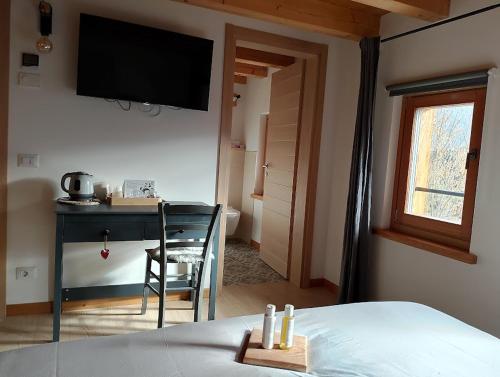 Ένα ή περισσότερα κρεβάτια σε δωμάτιο στο AGRITURISMO BORGO DAMOS