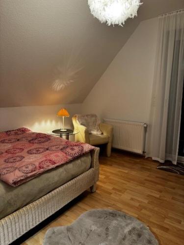 Cama o camas de una habitación en Ferienhaus Willenborg