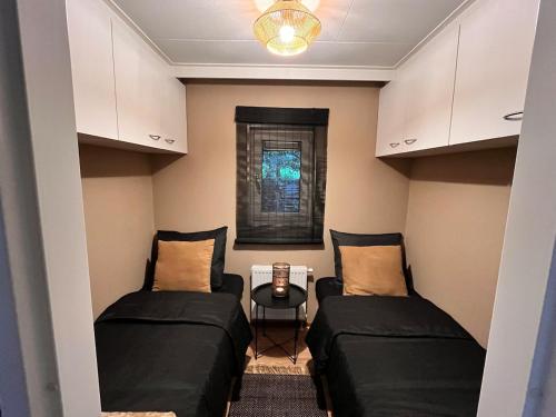 Istumisnurk majutusasutuses 't Tjilpplekje, 4-persoons chalet met privé hottub