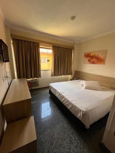 Ein Bett oder Betten in einem Zimmer der Unterkunft Hotel Nacional Inn Sorocaba
