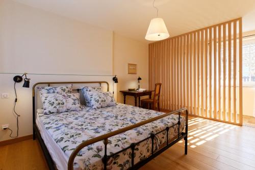 Ένα ή περισσότερα κρεβάτια σε δωμάτιο στο Mastignac Chambre d'hôte