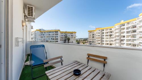 Quiet 2BR Retreat with Pool & Balcony by LovelyStay