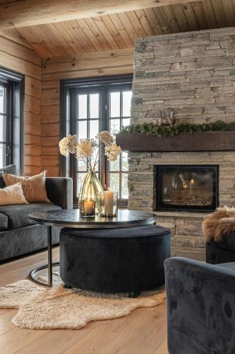Χώρος καθιστικού στο Traditional Feel In Modern Log Cabin