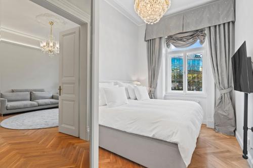 Postel nebo postele na pokoji v ubytování Vodickova Luxury Suites