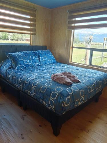Letto o letti in una camera di Cabañas Vista al Paine
