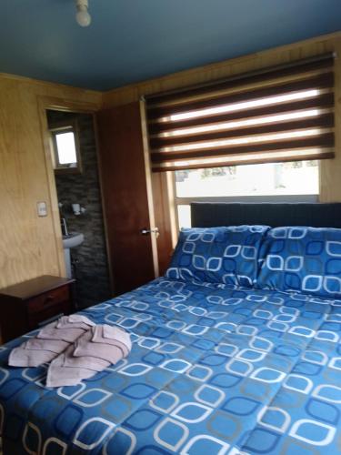 Letto o letti in una camera di Cabañas Vista al Paine