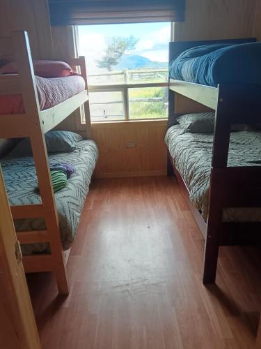 Letto o letti in una camera di Cabañas Vista al Paine