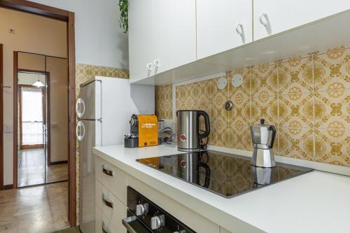 Una cocina o zona de cocina en Rapallo-Portofino, Chic and Cozy apt with pool