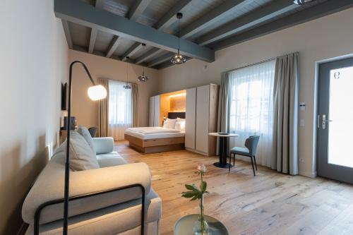 Postel nebo postele na pokoji v ubytování Boutique Hotel grüner Zweig