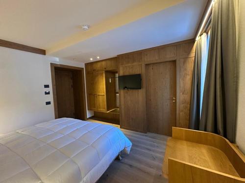 Et tv og/eller underholdning på Hotel Serena Cortina