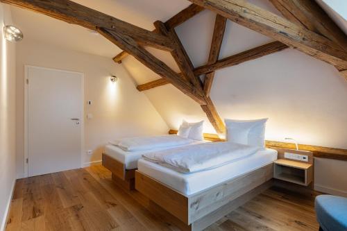 Katil atau katil-katil dalam bilik di Boutique Hotel grüner Zweig