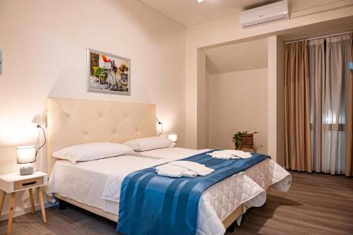 Posteľ alebo postele v izbe v ubytovaní Florence Rooms Novella