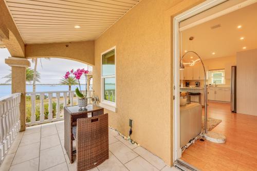 an open kitchen and dining room with a view of the ocean at Watch Dolphins St Augustine Gem Near Downtown! in St. Augustine