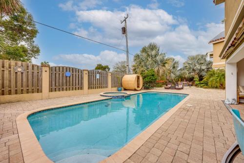 a swimming pool in a yard with a fence at Watch Dolphins St Augustine Gem Near Downtown! in St. Augustine