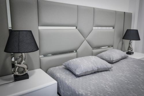 Katil atau katil-katil dalam bilik di Apartamento Ver o Mar