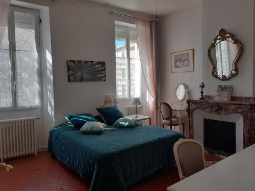 Grande chambre avec parties communes en bord de mer