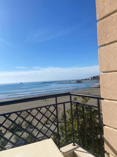 a view of the beach from a balcony at Hotel Brilant in Shëngjin