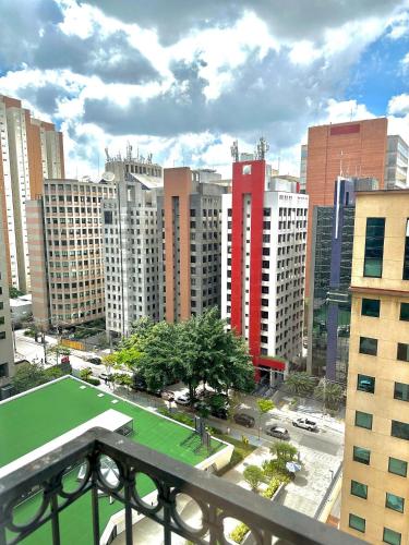 a view of a city with tall buildings at Flat Funchal JK Vila Olímpia Limpeza Diária in Sao Paulo