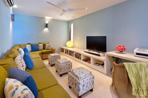 Televisor o centre d'entreteniment de Tom Tom 4 bed villa
