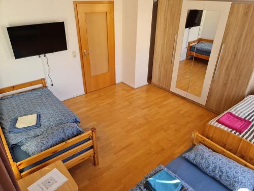 Postel nebo postele na pokoji v ubytování Ferienwohnung Dippoldiswalde