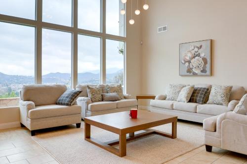 a living room with couches and a coffee table at 2 Mi to Promenade at Westlake Mtn-View Haven! in Westlake Village