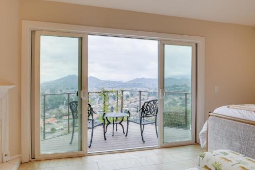 a bedroom with a balcony with a table and chairs at 2 Mi to Promenade at Westlake Mtn-View Haven! in Westlake Village