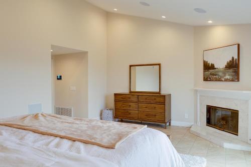 a bedroom with a bed and a fireplace at 2 Mi to Promenade at Westlake Mtn-View Haven! in Westlake Village