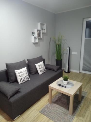 Χώρος καθιστικού στο Apartamenty Jana Pawła