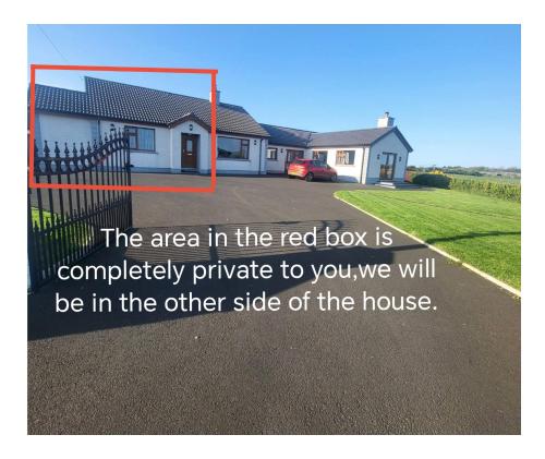 a picture of a house with a red box at Guest suite in private part of house NITB approved, own entrance in Ballintoy