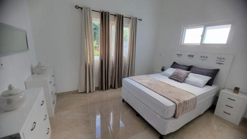 Ένα ή περισσότερα κρεβάτια σε δωμάτιο στο Santa Fe House