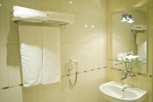 Koupelna v ubytování Neven Hotel