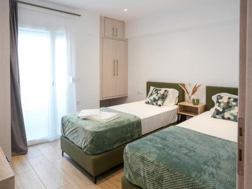 Katil atau katil-katil dalam bilik di Yasemi - VN Luxury Apartments