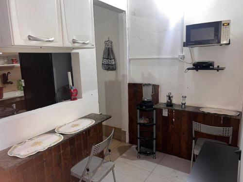 Dapur atau dapur kecil di Aconchego do Lar