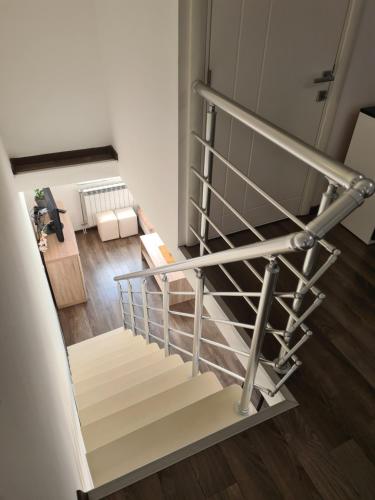an overhead view of a staircase in a house at Duplex Family Apartment in Skopje