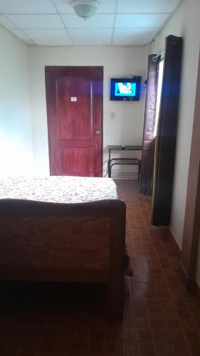 TV a/nebo společenská místnost v ubytování Hostal Beiro